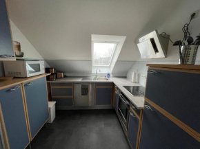 Apartment für Arbeiter und Reisende, Wilhelm-Busch